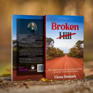 copy of fiona's book Broken Hill standing on the ground showing the back cover and a front cover of the book