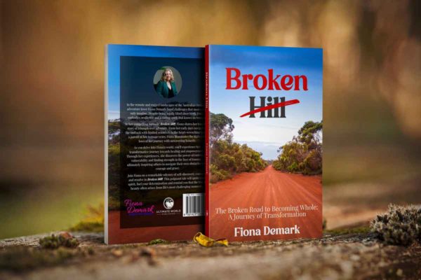 copy of fiona's book Broken Hill standing on the ground showing the back cover and a front cover of the book